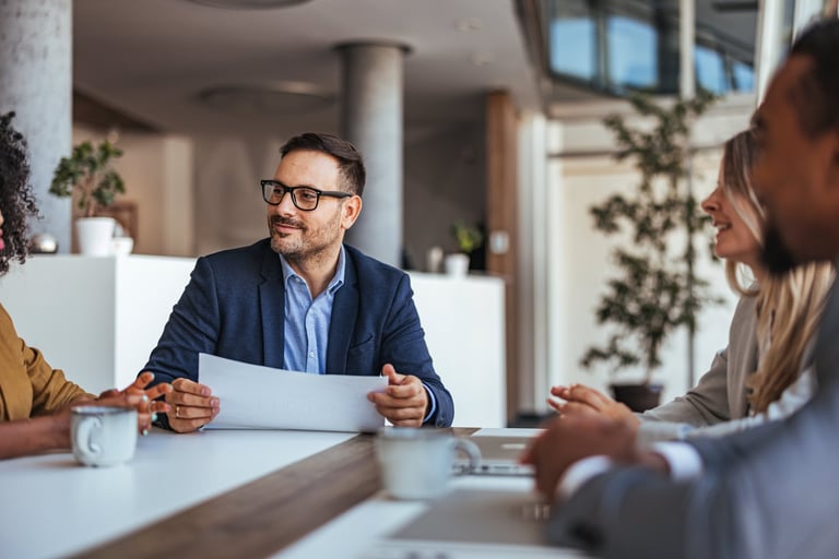 Diverse team engaging in business meeting in modern office